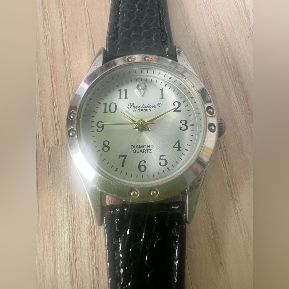 Precision by Gruen ladies silver tone black leather dress watch NEW BATTERY